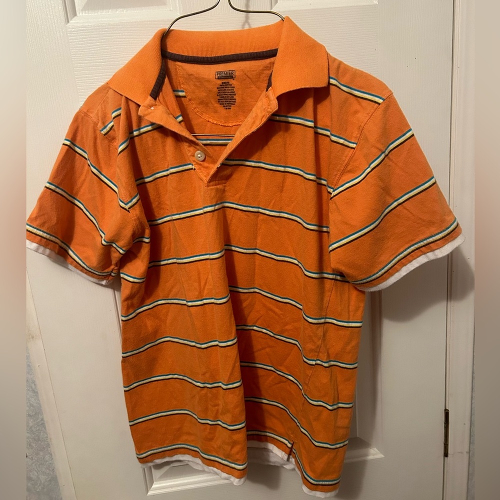 Premier international boys polo shirt.